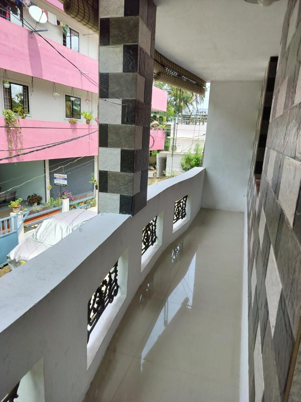 Cozy Haven Apartment Kochi Екстериор снимка
